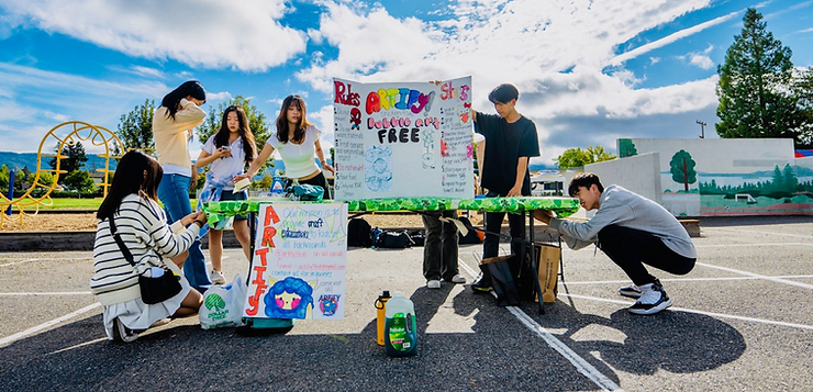 Artify members setting up their booth at John Muir Elementary School